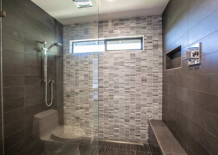 Newly remodeled shower in Albany GA boasts gorgeous tile.